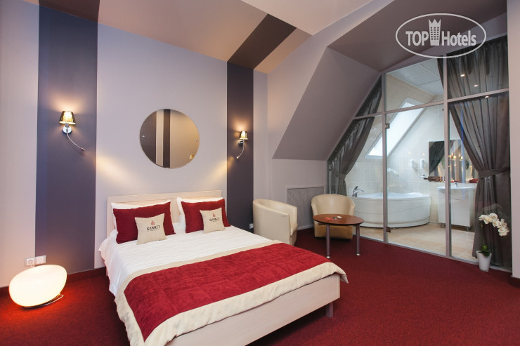 Фото Garnet Hotel