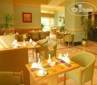 Photos Triumph Plaza Hotel