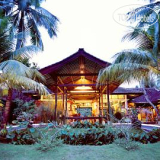 Фото Candi Beach Cottage