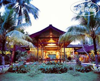 Фото Candi Beach Cottage