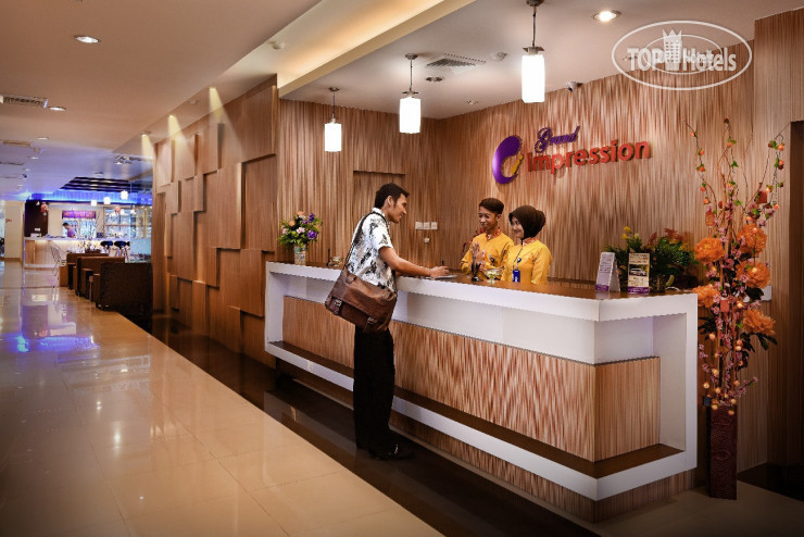 Фото Grand Impression Hotel