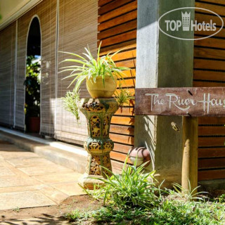 Фото The River House