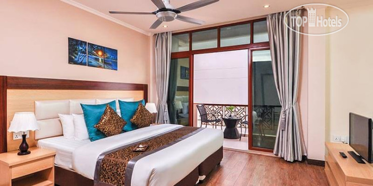 Фото Triton Beach Hotel & Spa