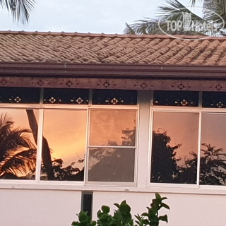 Фото Happy Cocos Beach House