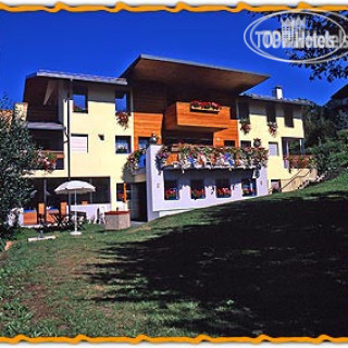 Фото Garni Enrosadira Hotel Vigo di Fassa