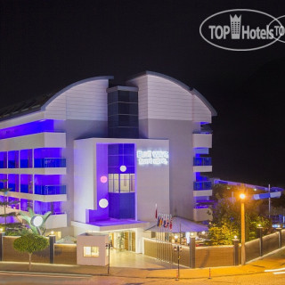 Фото Blue Wave Suite Hotel