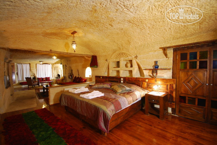 Фото Urgup Evi Cave Hotel
