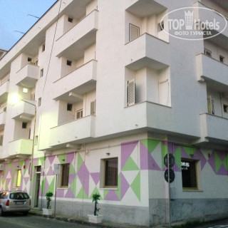 Фото La Perla Hotel 