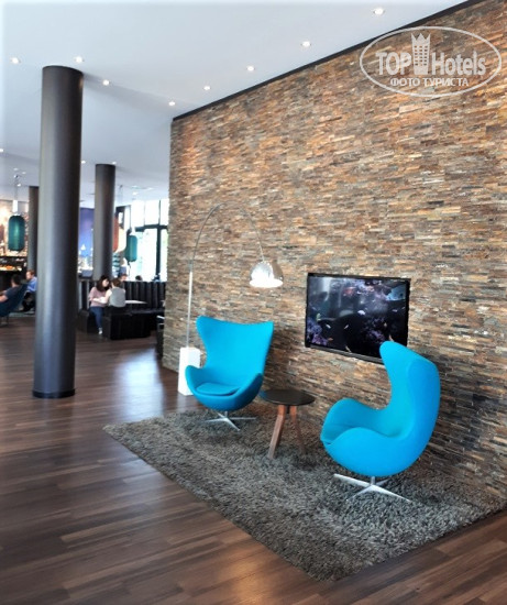 Фото Motel One Dusseldorf Hauptbahnhof