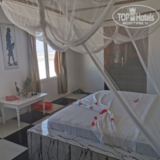 Фото Makuti Beach Bungalows