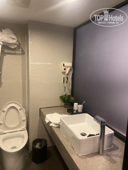 Hotelier's photos 7Days Inn Haikou Middle Haixiu Road 2*